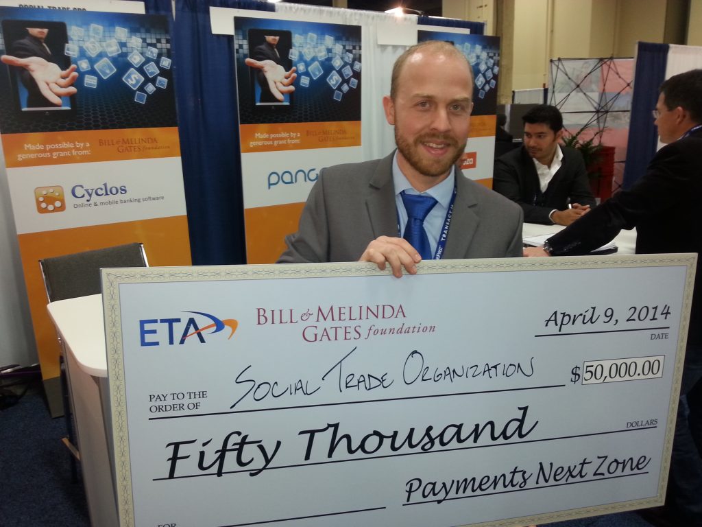 Roder van Arkel showing the ePay Innovation Award Cheque